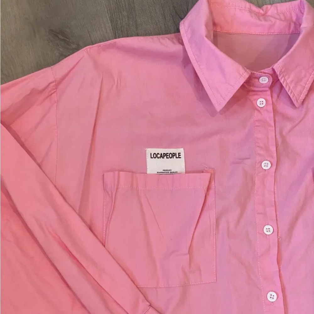 Oversized pink shirt with tag detail